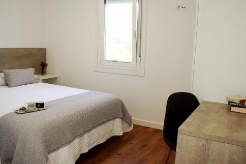 Habitación doble con cama de matrimonio de 150 cm.