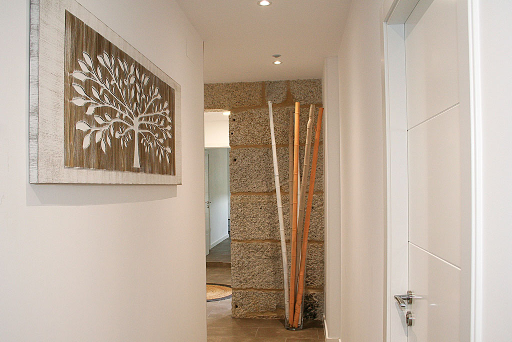 pasillo de acceso habitaciones en Pensión Ponte das Febres